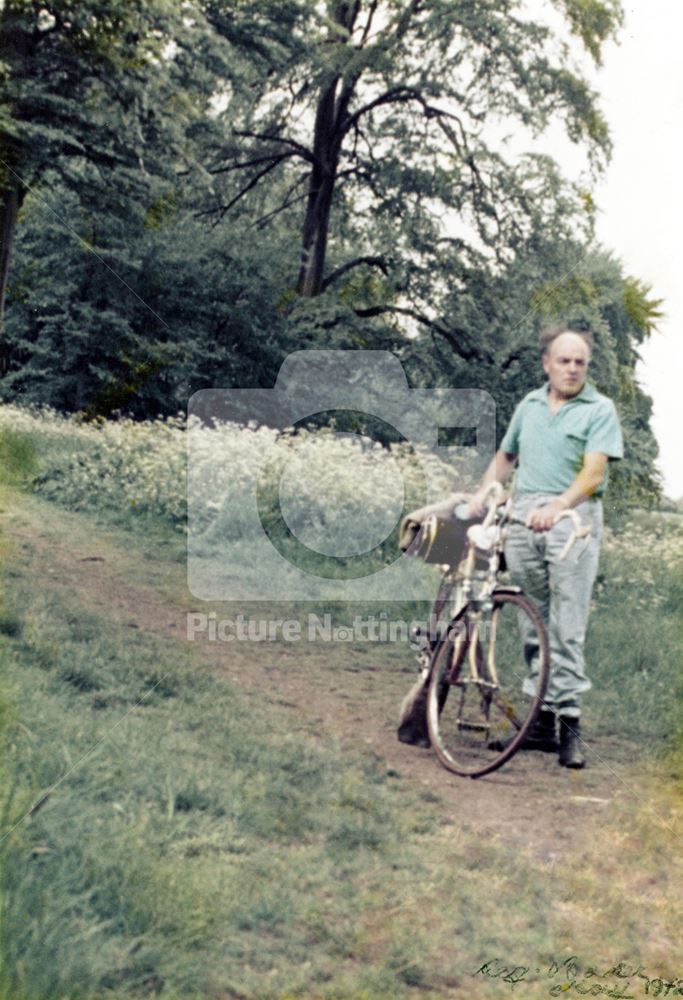 Mr Reg Baker and bicycle - delayed action photograph