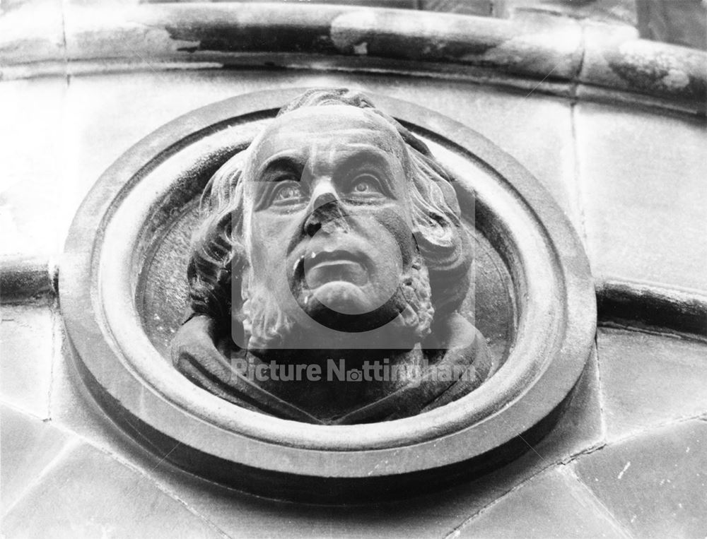 Stone head architectural detail - The Express Building