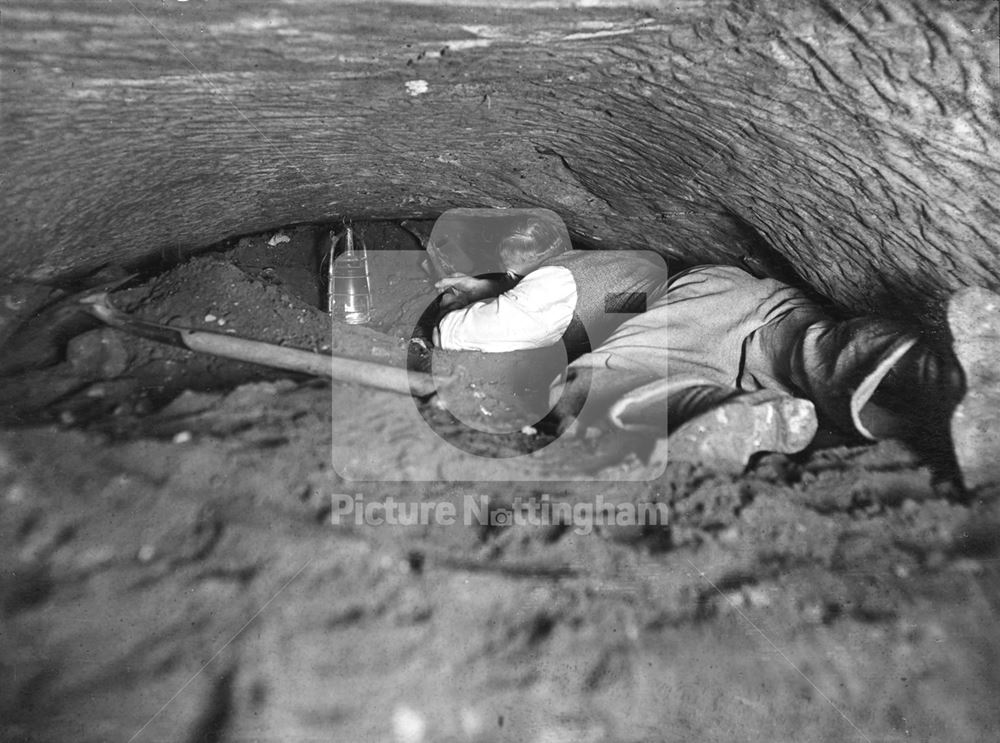 Nottingham Castle, H Houldsworth clearing debris in Water cave, Mortimers Hole 1938