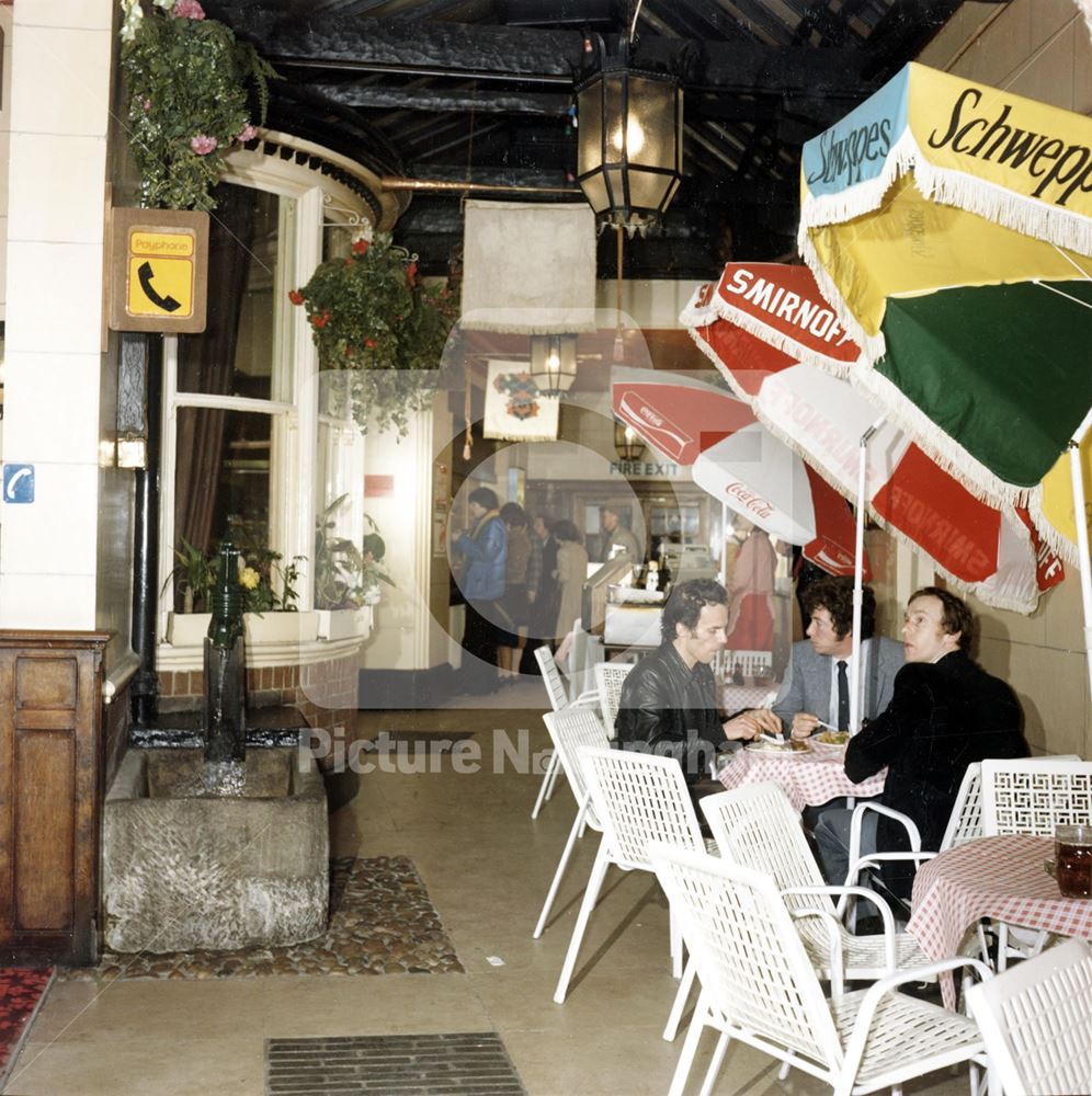 The Flying Horse Hotel, Interior, Entrance passageway showing water pump and trough