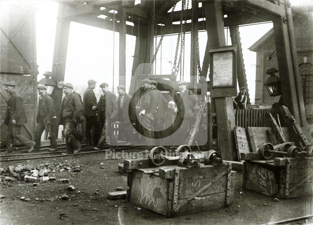 Miners coming out of the lift at the top of the shaft, Clifton Colliery , Nottingham