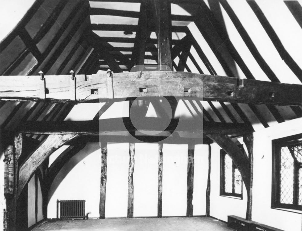 An interior view of the first floor and Crown-Post roof beams of the 'Severns' building prior to rem