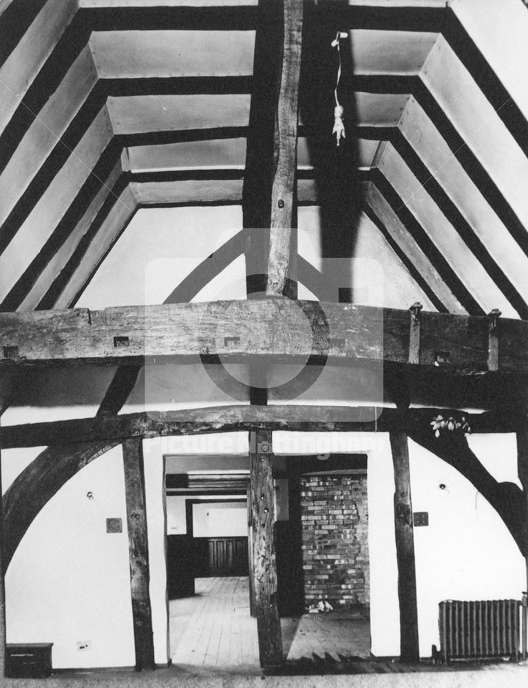 An interior view of the first floor and King-Post roof beams of the 'Severns' building prior to remo