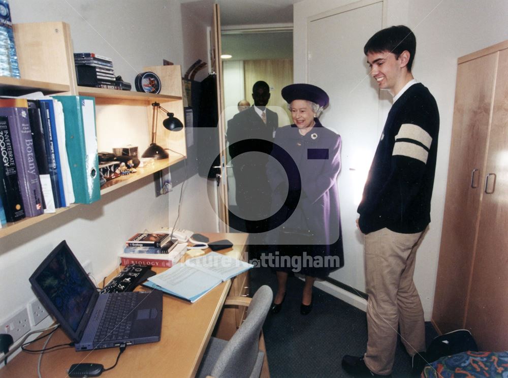 Queen Elizabeth II with student Ryan Downie following the opening ceremony of the Jubilee Campus