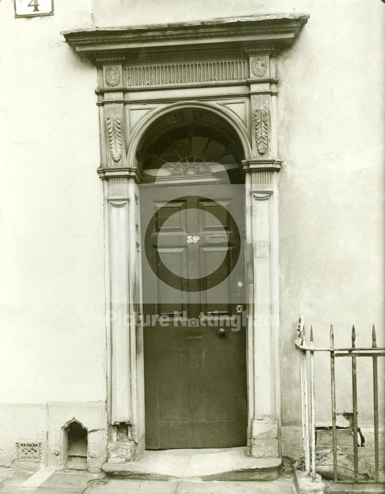 Detail of the doorway of 58a Castle Gate