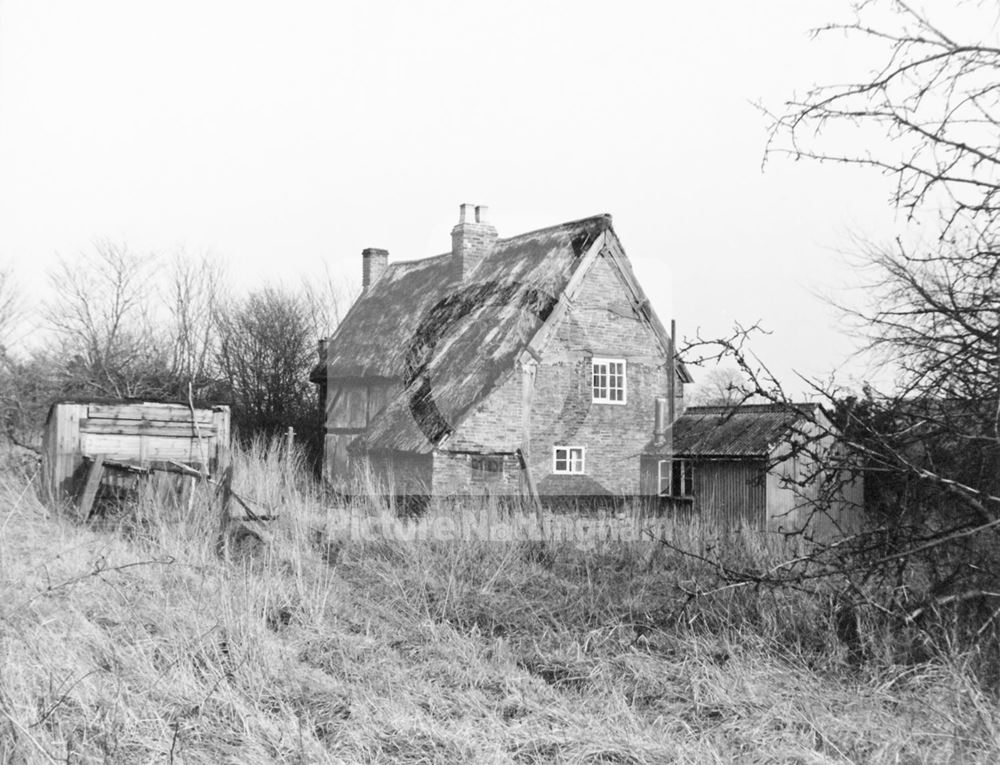 A timber-framed thatched cottage - Clifton Village