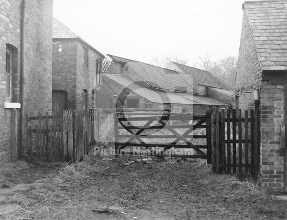 A farmhouse yard and out-buildings - Clifton Village