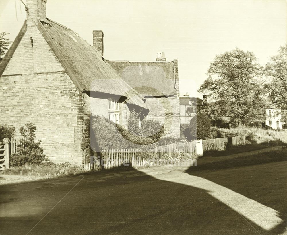 General view showing a thatched cottage - Clifton Village