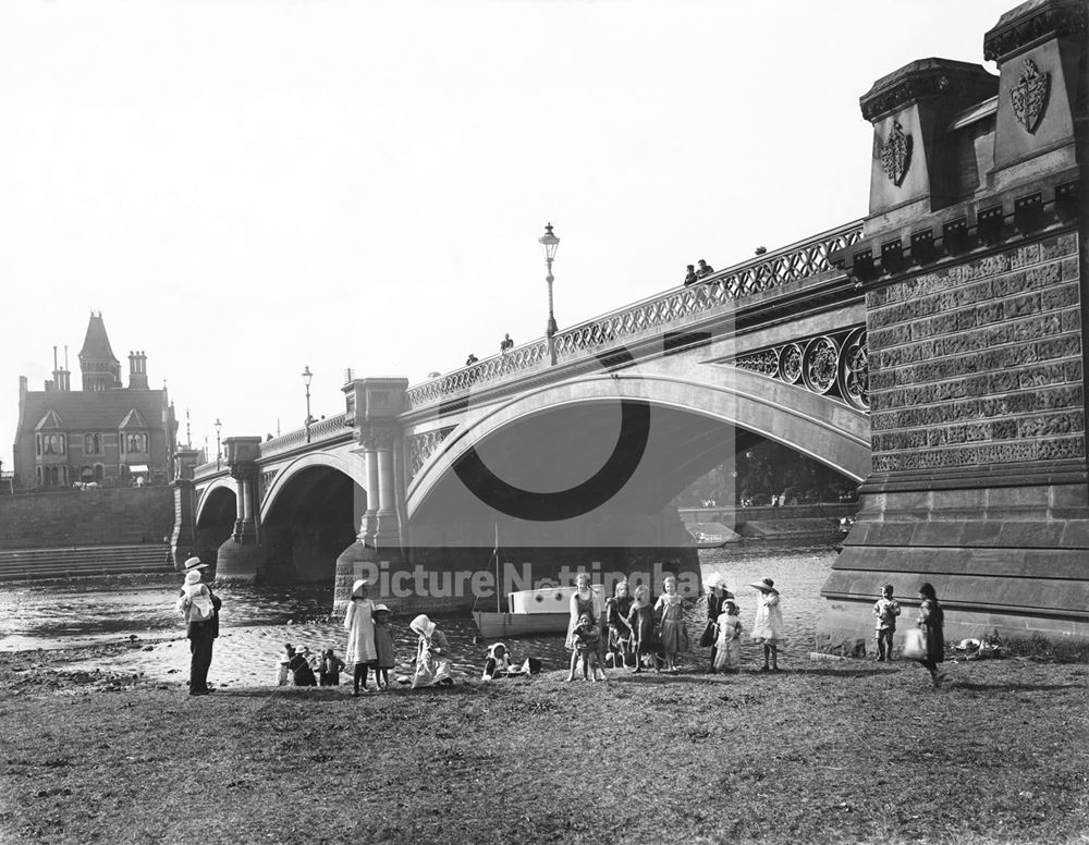 Children playing on the embankments of the River Trent, Trent Bridge