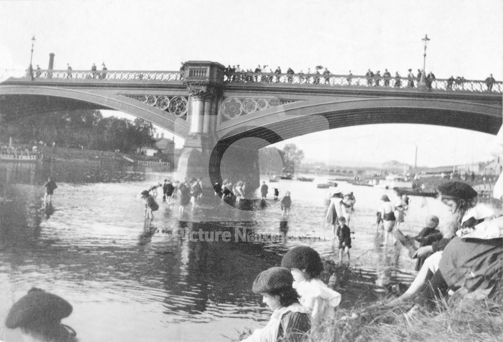 Children playing in the river Trent at Trent Bridge