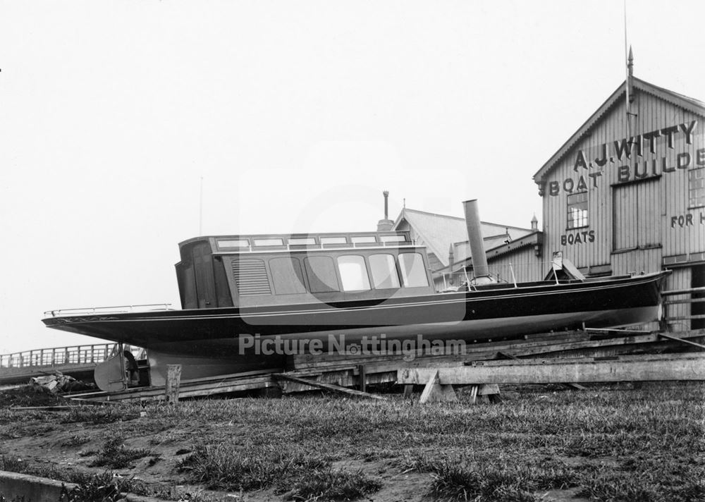 A new boat on the River Trent embankment, at A J Whitty's boat builders yard, Trent Bridge