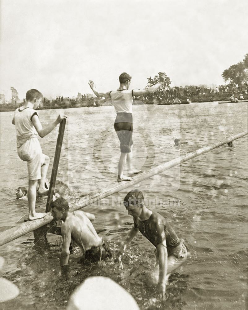 Boys 'Walking the greasy pole' at the Rowing Club regatta