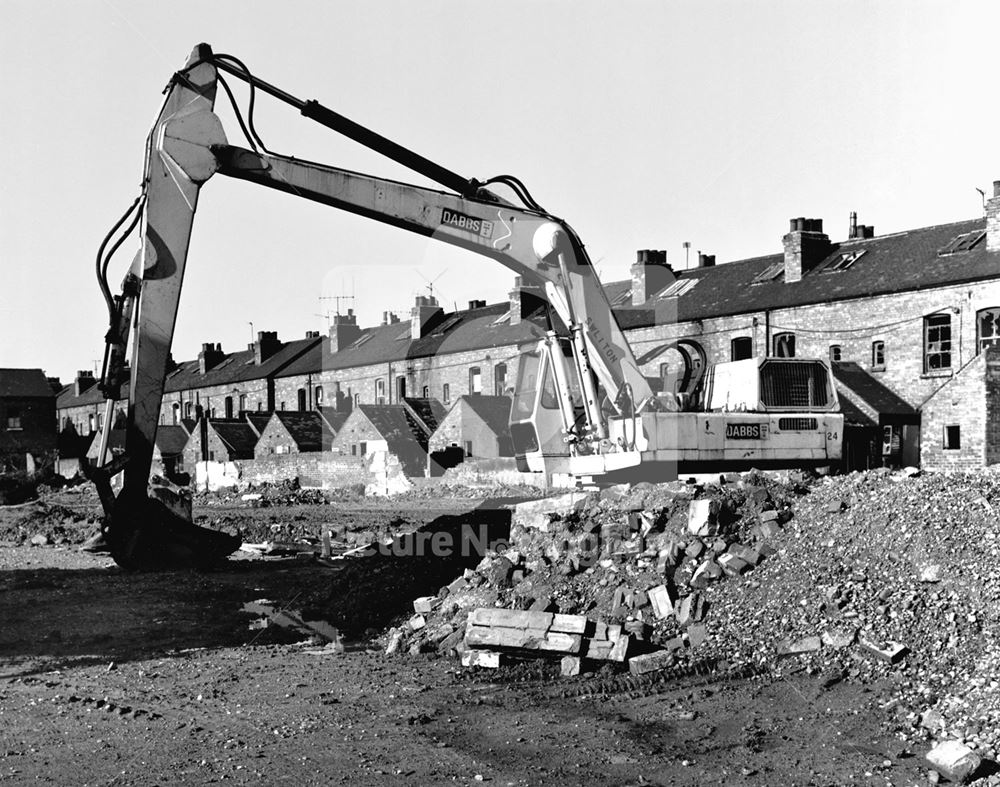 360 degree digging machine near Goodhead Street during demolition