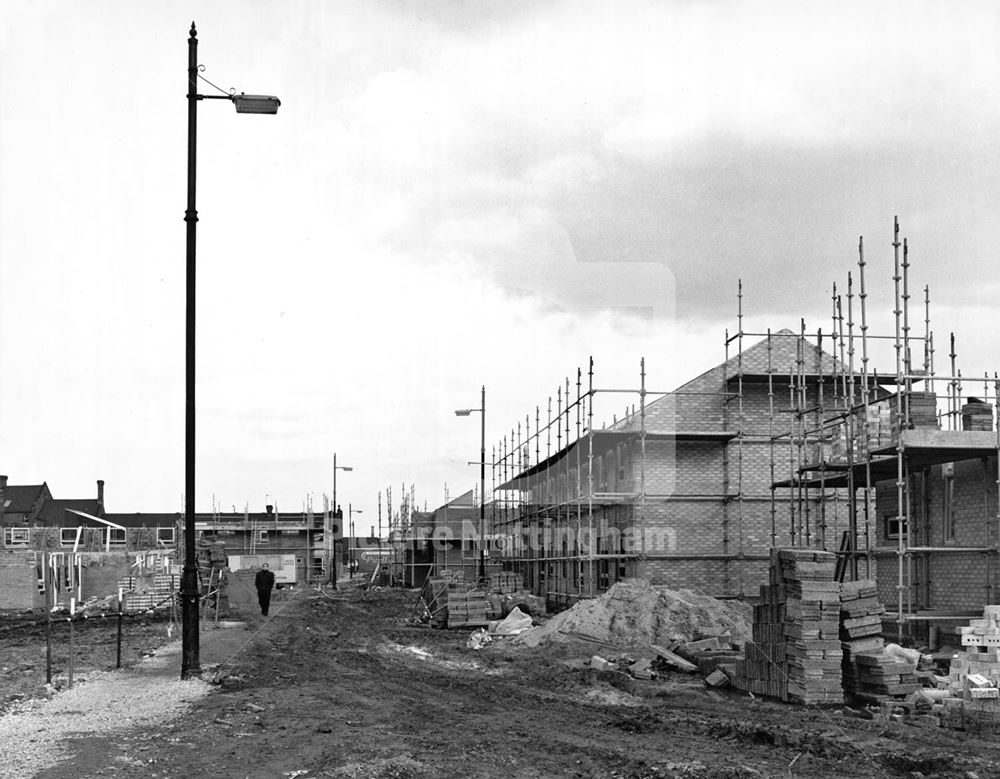 The re-building of the Meadows (note the old lamp posts which remained from the old street layout)