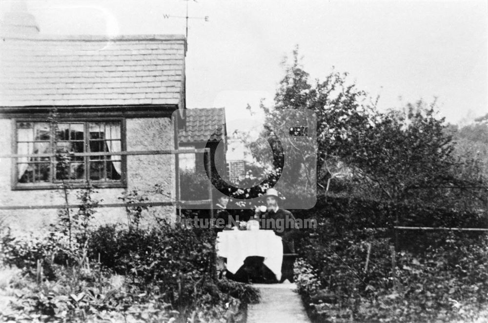 Mr and Mrs G Bell take tea at their summer house, Hungerhill Gardens, St Ann's