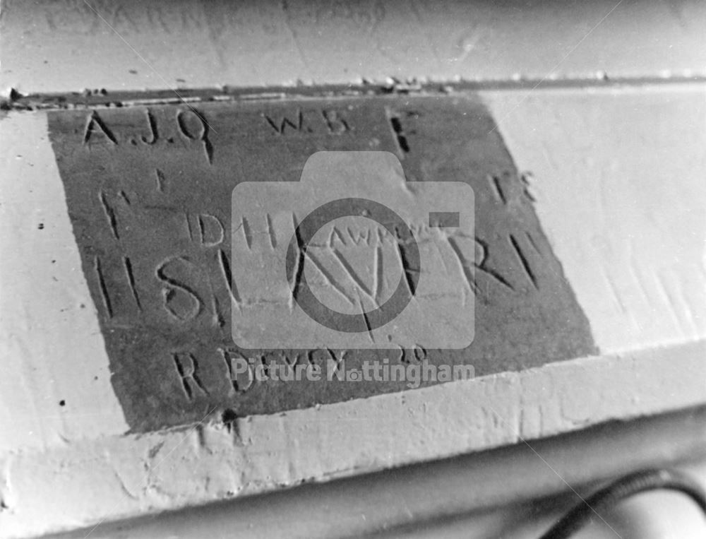 D H Lawrence's name carved into a windowsill