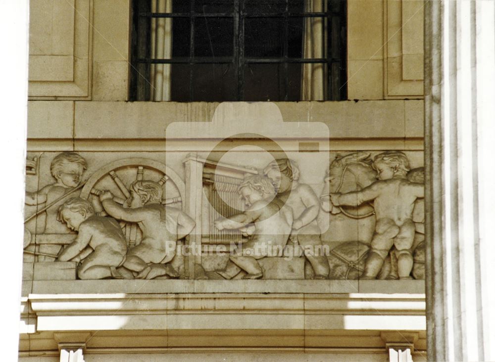 Council House - architectural detail of the 'trades' frieze behind the front columns - 'Textile Trad