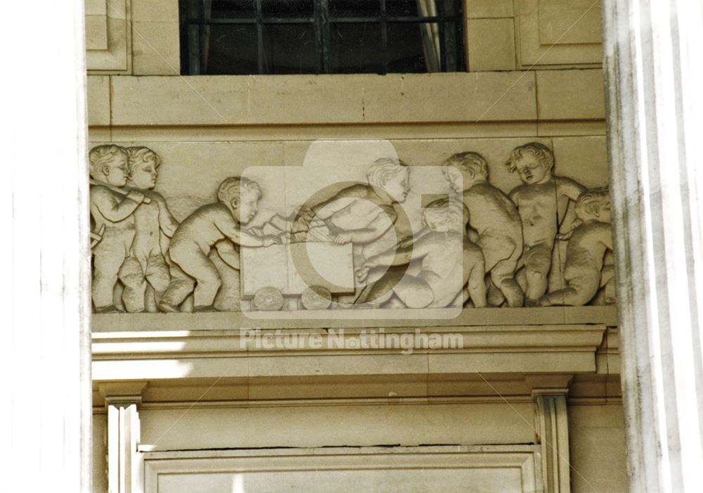 Council House - architectural detail of the 'trades' frieze behind the front columns - 'Mining'