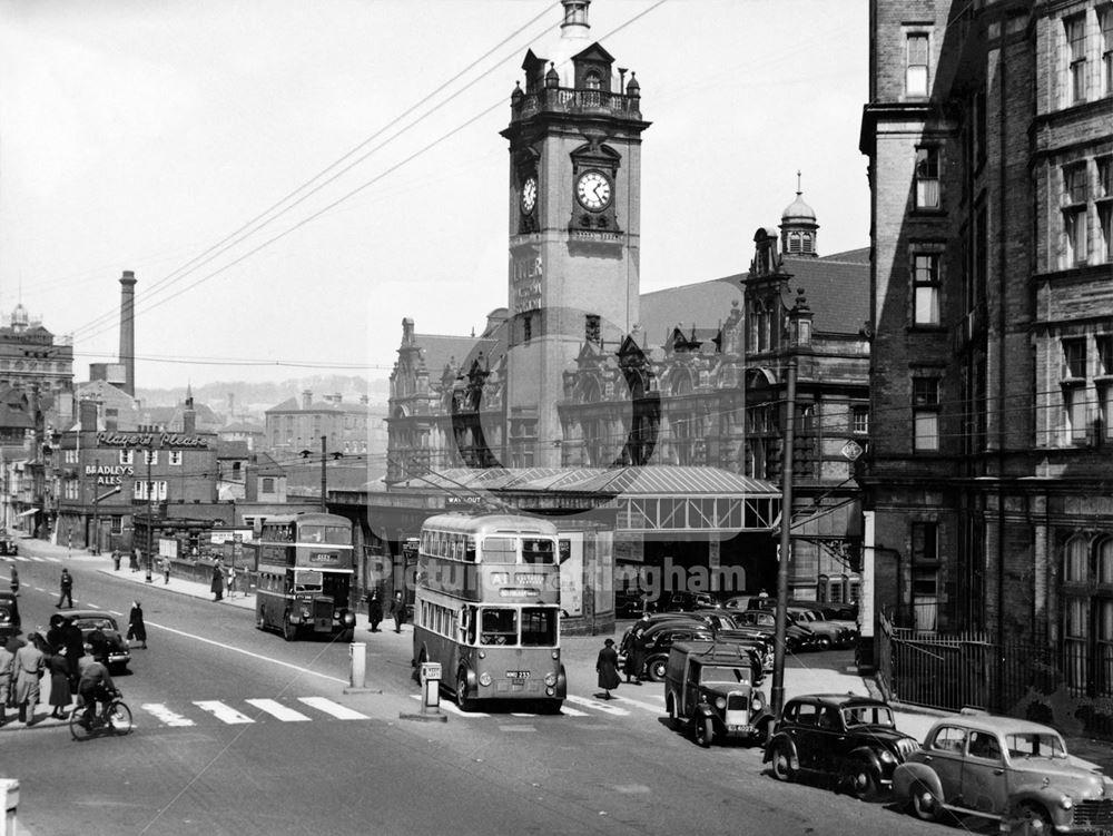 Trolley buses in front of the LNER Victoria Railway Station, and the Victoria Station Hotel