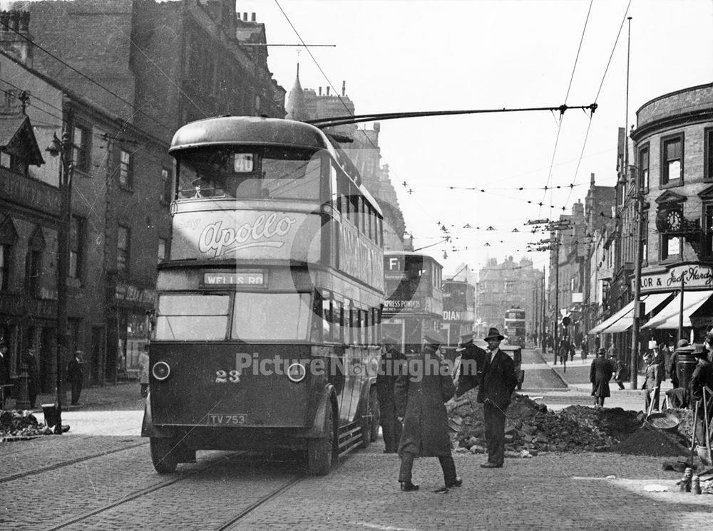 Nottingham Corporation trolley bus (English Electric chassis and body) - followed by 2 trams