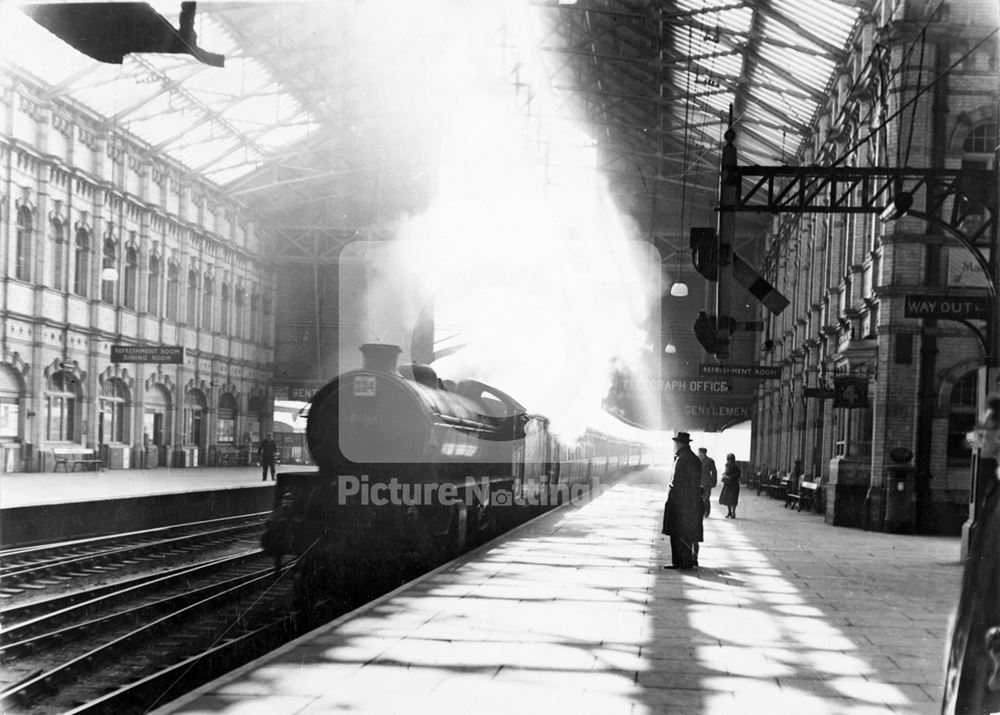 Victoria Railway Station - steam locomotive (no 334), train and platforms