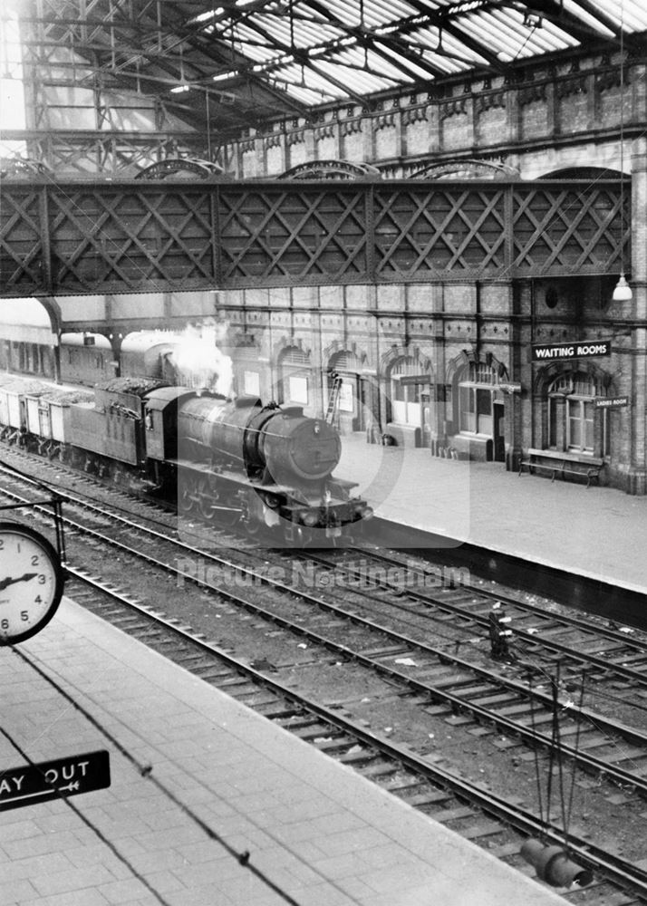 Victoria Railway Station interior - 'WD' Steam locomotive and coal train alongside a platform