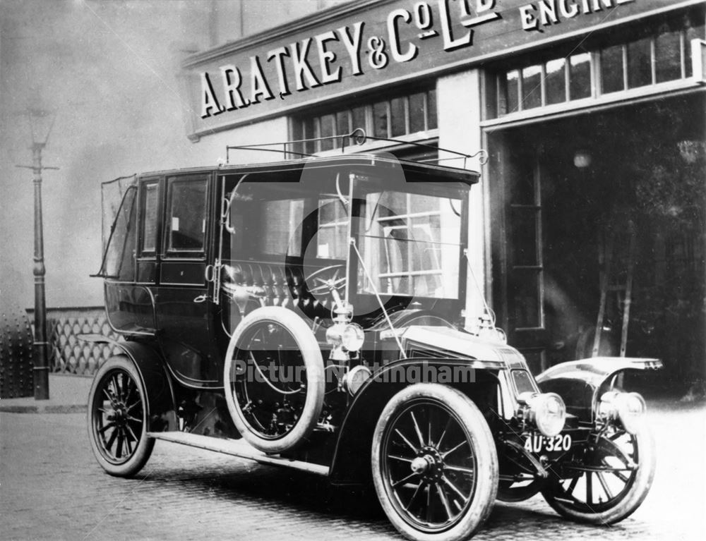 A Renault 20HP motor car reg. no. AU320 at A R Atkey's garage