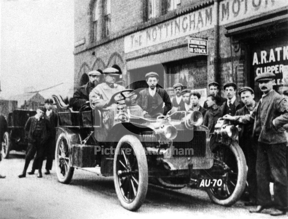 Motor Cars and spectators outside A R Atkey's Garage