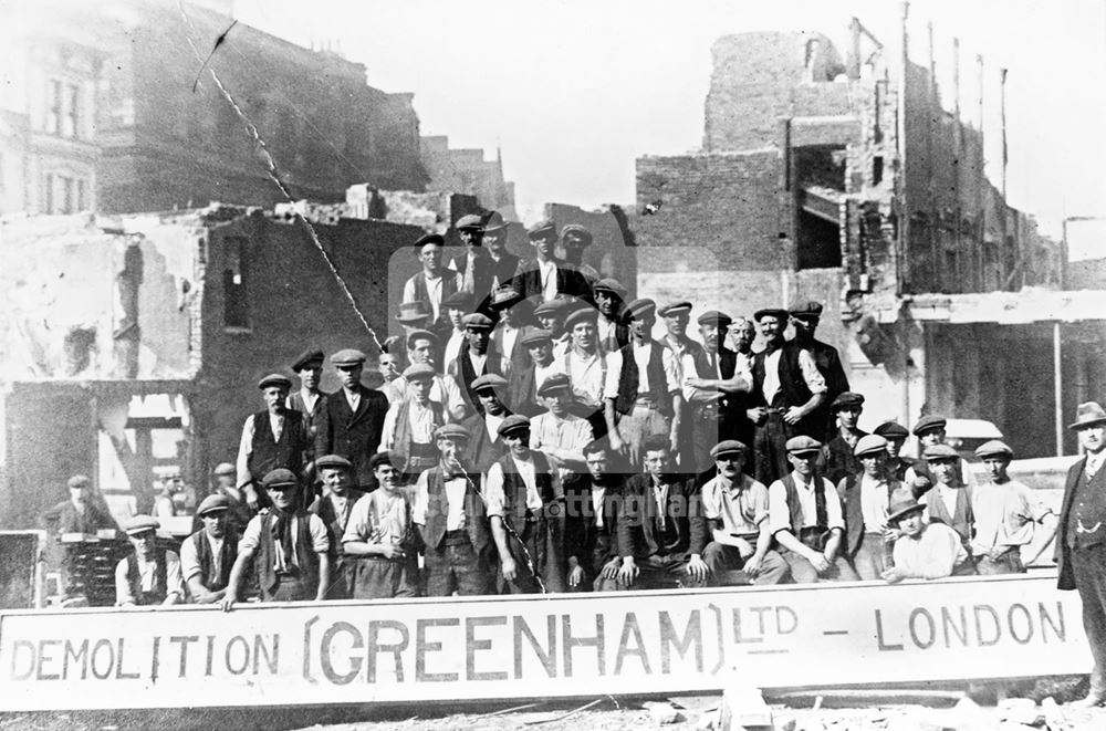 Demolition workers by the old Exchange