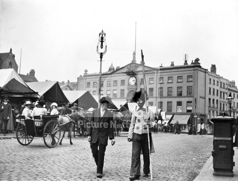 Minstrel in the Market Place, from South Parade