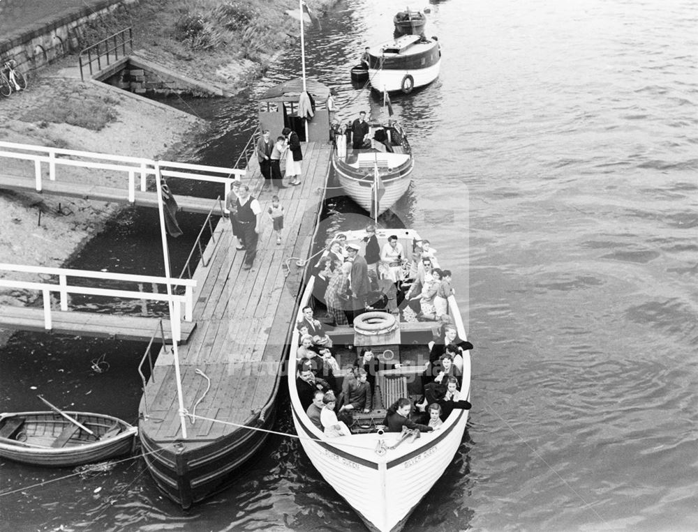 Passengers on the Silver Queen pleasure boat on the River Trent at Trent Bridge