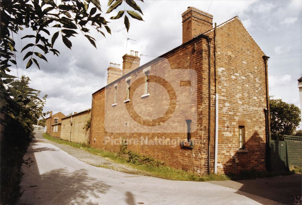 Rear of houses by Clayton's Wharf boatyard, Nottingham Canal