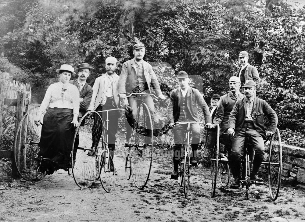 A group of cyclists on an outing at an unknown location