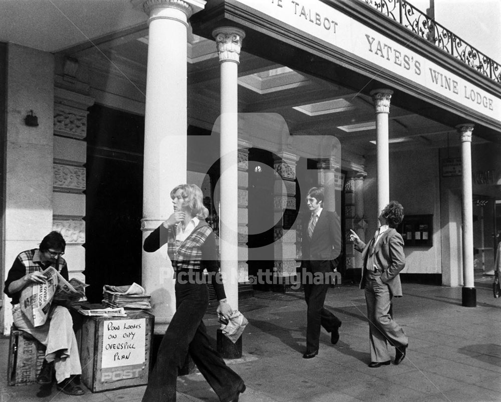 Newspaper seller by Yates's Wine Lodge (The Talbot)