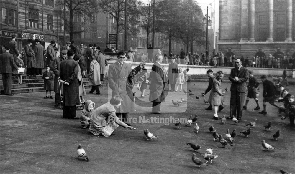 Feeding pigeons, Old Market Square