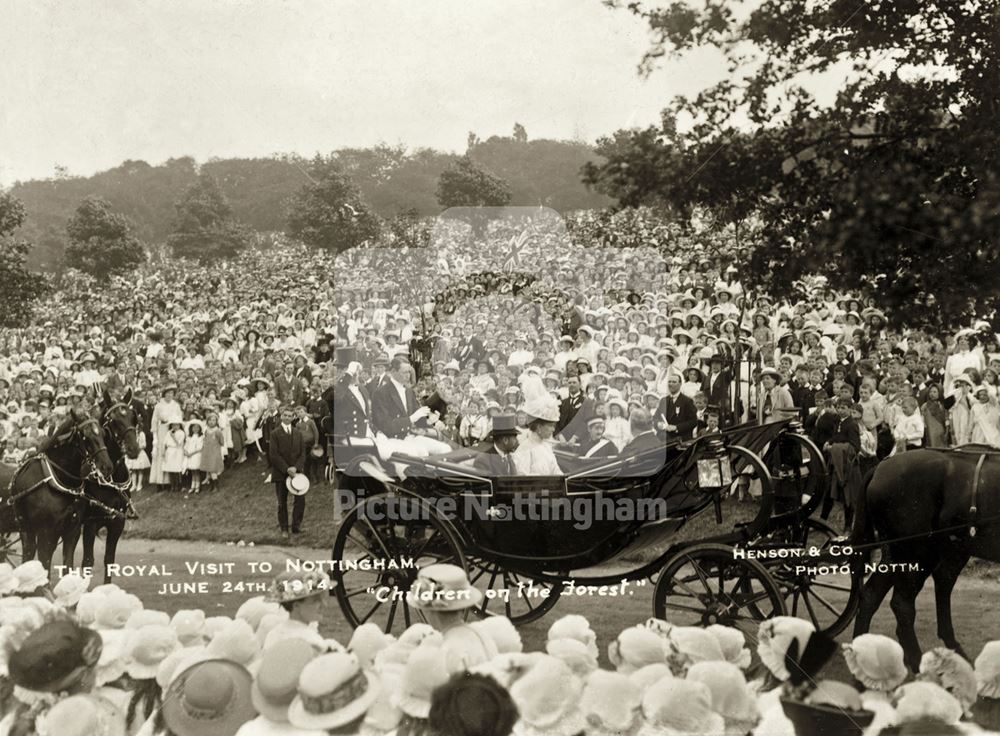 King George V and Queen Mary pass by crowds of schoolchildren on their visit to Nottingham in 1914