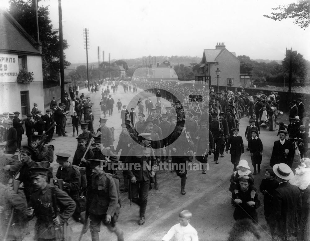 Soldiers of the Sherwood Foresters (?) march past the Rose and Crown. (the date given for this pictu