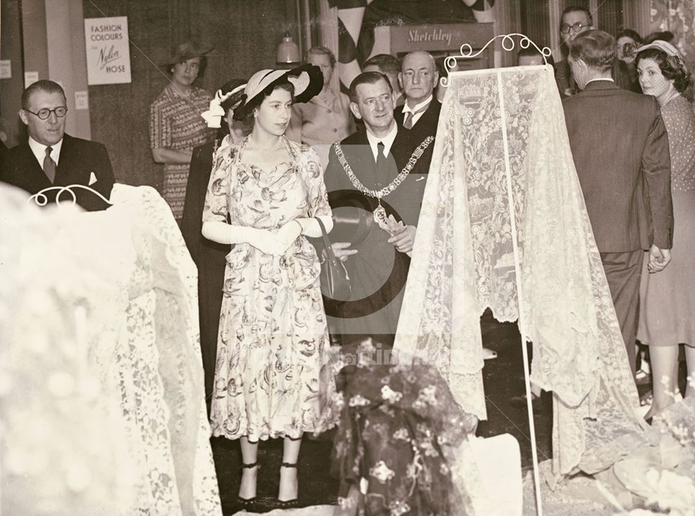 Admiring Nottingham lace during the Royal visit of Princess Elizabeth and the Duke of Edinburgh