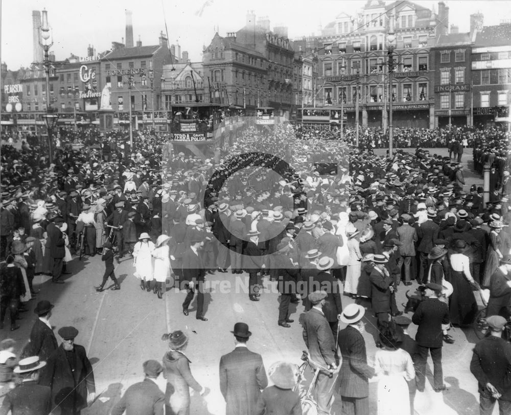 Sherwood Foresters marching through crowds across Market Place, from Market Street to Wheeler Gate 1