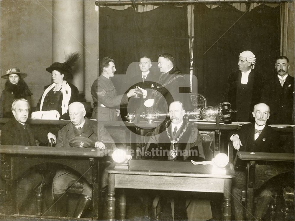 Presentation, in the Exchange building, of a silver tea service to Alfred Joseph Knight VC. The gent