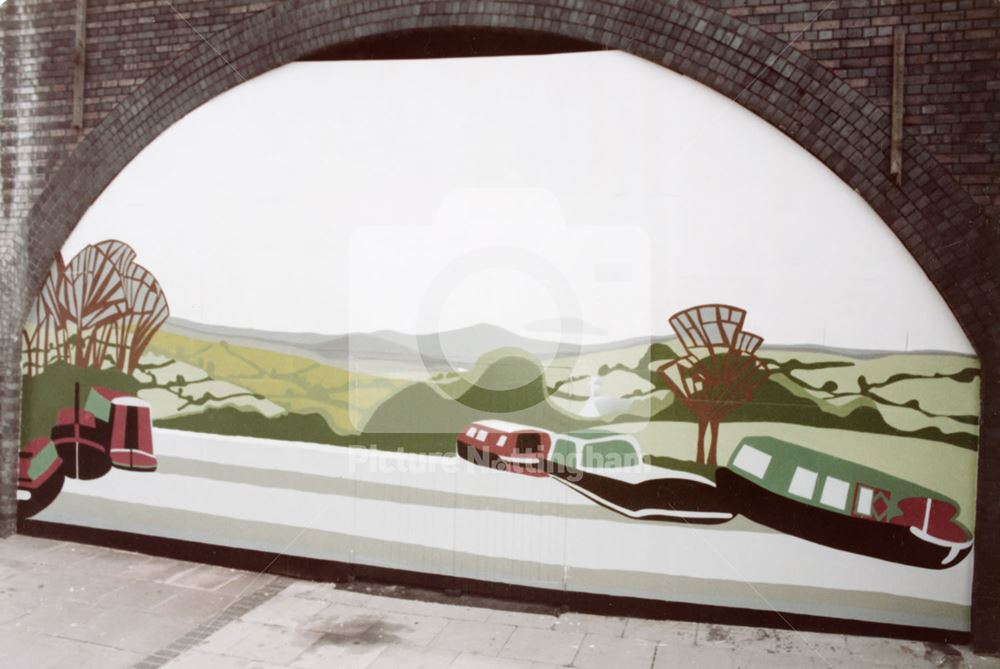 Murals in the brickwork arches of the Weekday Cross Junction viaduct