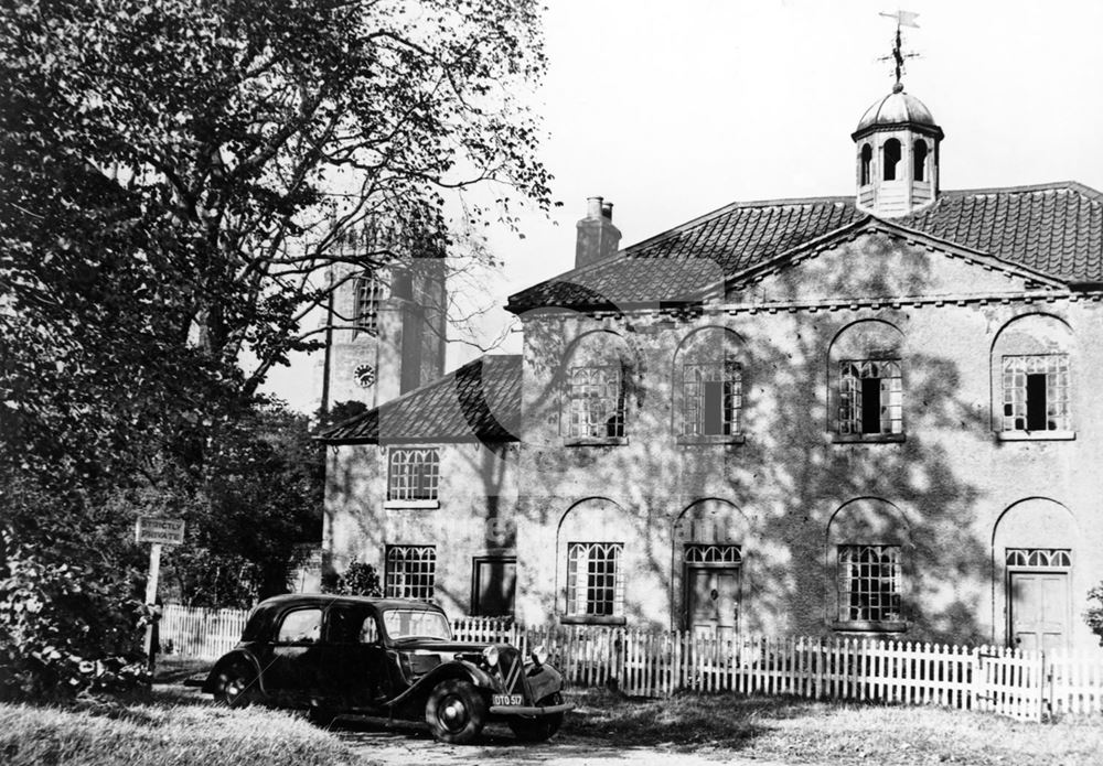 House with St Mary and St Martin's Church in background, Church Green, Blyth, c 1930s?